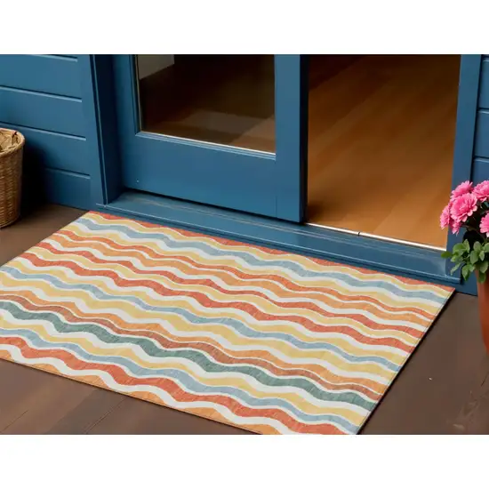 Coral Ivory And Gold Striped Washable Indoor Outdoor Area Rug Photo 1