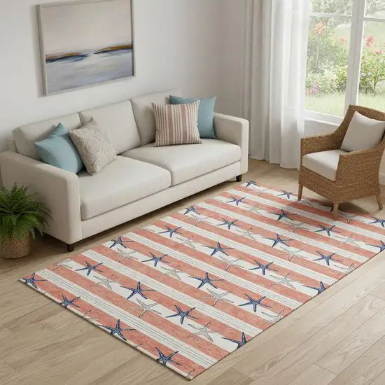 Coral Ivory And Navy Blue Geometric Washable Area Rug With UV Protection Photo 1