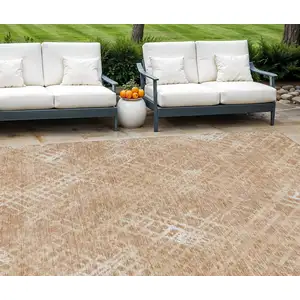 Photo of Coral Ivory And Peach Geometric Washable Indoor Outdoor Area Rug