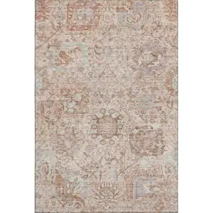 Photo of Coral Ivory And Rust Damask Washable Area Rug With UV Protection