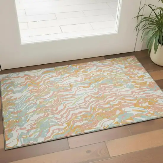 Coral Mint Green And Sky Blue Abstract Washable Area Rug With UV Protection Photo 1