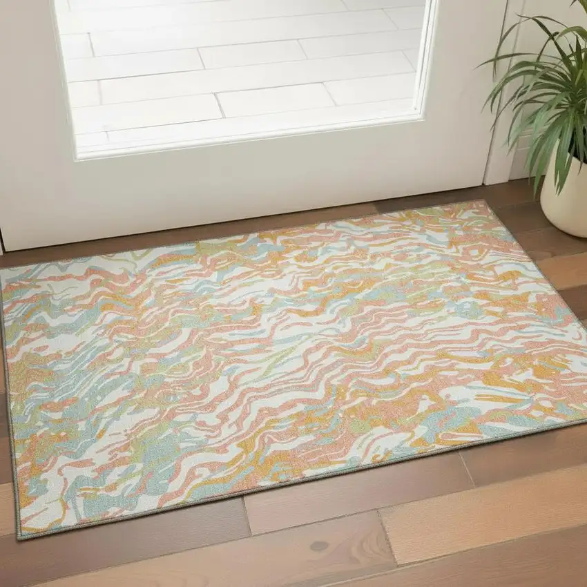 Coral Mint Green And Sky Blue Abstract Washable Area Rug With UV Protection Photo 1