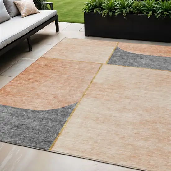 Coral Peach And Gray Abstract Washable Indoor Outdoor Area Rug Photo 1