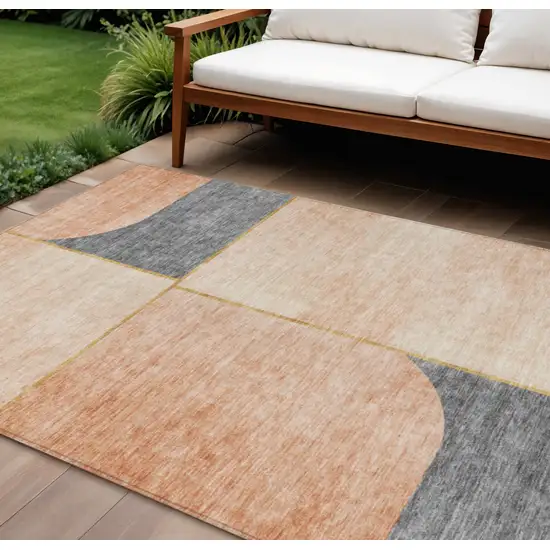 Coral Peach And Gray Abstract Washable Indoor Outdoor Area Rug Photo 1