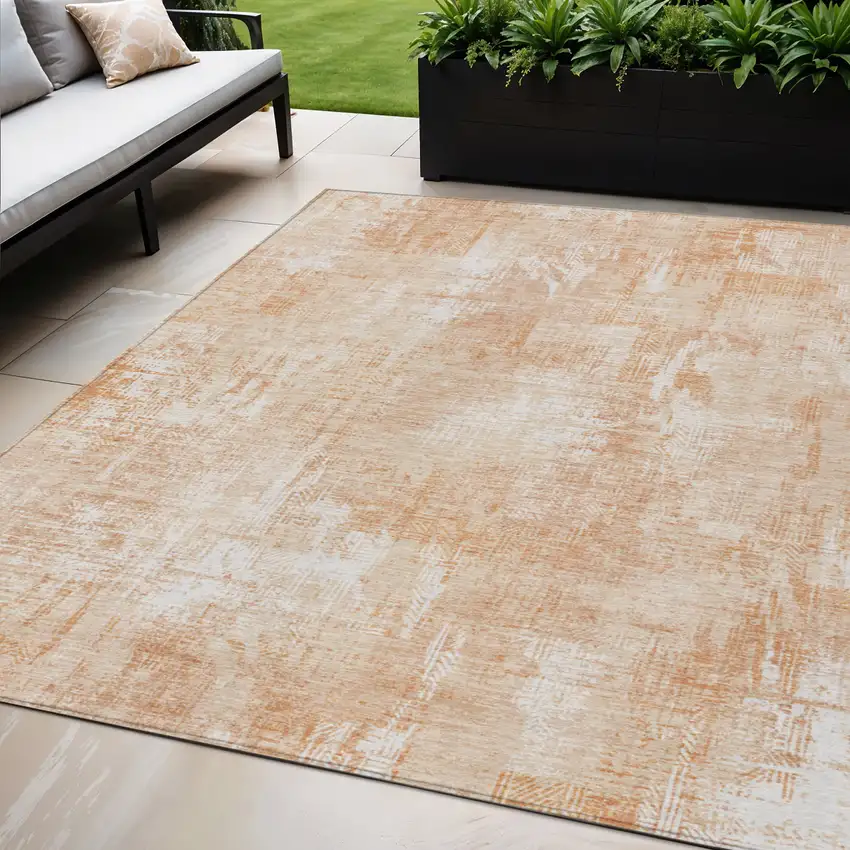 Coral Peach And Ivory Abstract Washable Indoor Outdoor Area Rug Photo 1