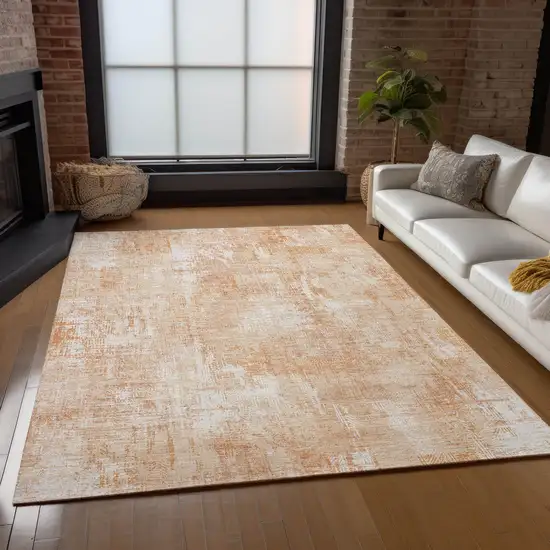 Coral Peach And Ivory Abstract Washable Indoor Outdoor Area Rug Photo 9