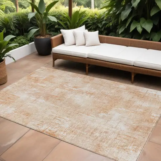 Coral Peach And Ivory Abstract Washable Indoor Outdoor Area Rug Photo 1