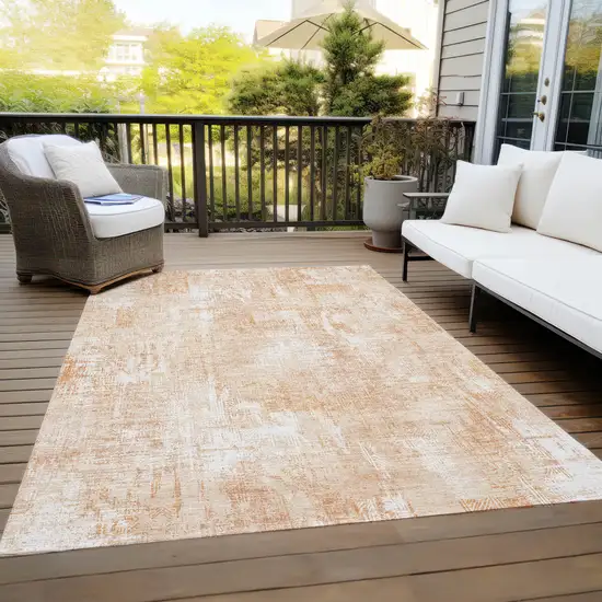 Coral Peach And Ivory Abstract Washable Indoor Outdoor Area Rug Photo 9