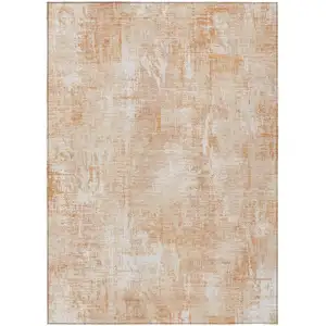 Photo of Coral Peach And Ivory Abstract Washable Indoor Outdoor Area Rug