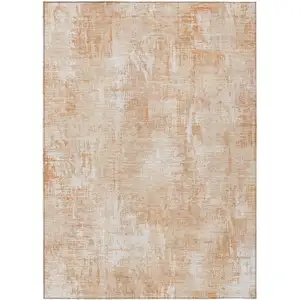 Photo of Coral Peach And Ivory Abstract Washable Indoor Outdoor Area Rug