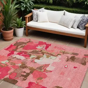 Photo of Coral Pink And Brown Abstract Washable Indoor Outdoor Area Rug
