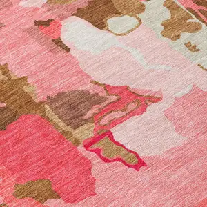 Photo of Coral Pink And Brown Abstract Washable Indoor Outdoor Area Rug