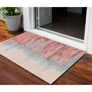 Photo of Coral Pink And Gray Abstract Washable Indoor Outdoor Area Rug