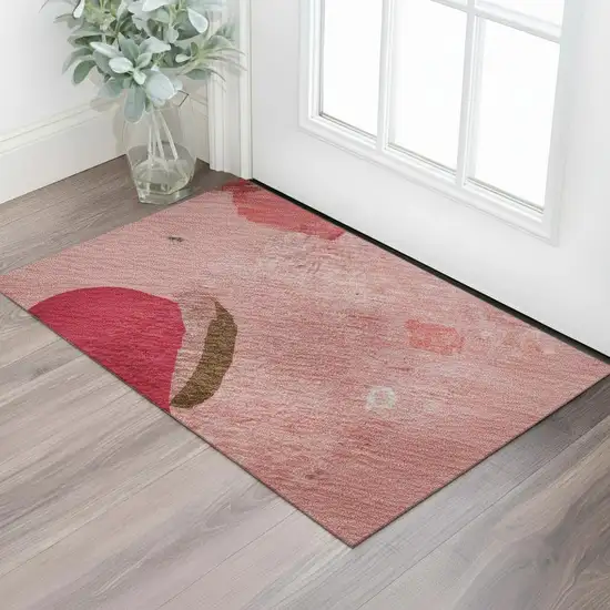 Coral Pink And Ivory Abstract Washable Area Rug With UV Protection Photo 2