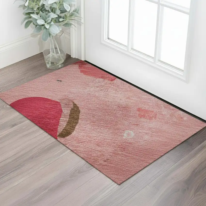 Coral Pink And Ivory Abstract Washable Area Rug With UV Protection Photo 2