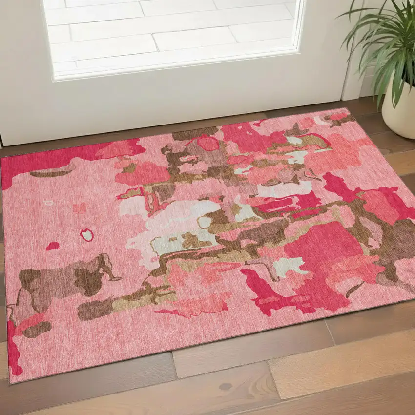 Coral Pink And Ivory Abstract Washable Area Rug With UV Protection Photo 1