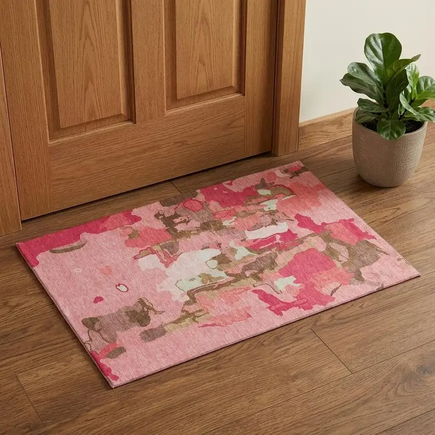 Coral Pink And Ivory Abstract Washable Area Rug With UV Protection Photo 1