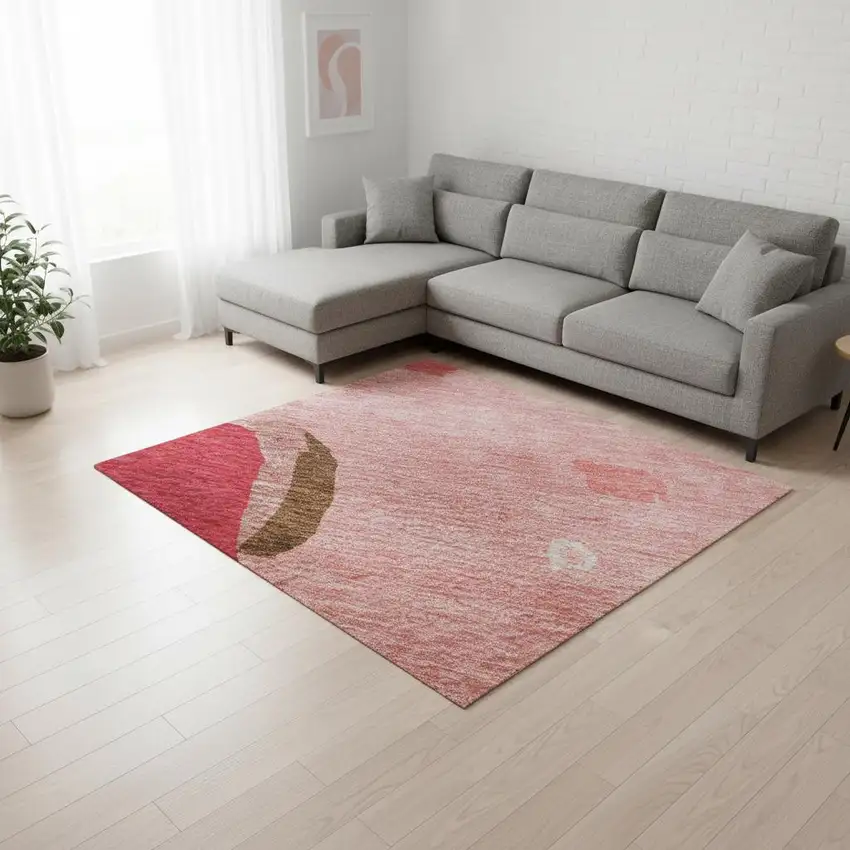 Coral Pink And Ivory Abstract Washable Area Rug With UV Protection Photo 1