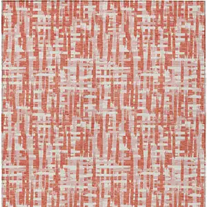 Photo of Coral Pink And Ivory Abstract Washable Indoor Outdoor Area Rug