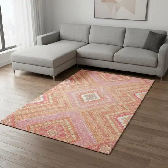 Coral Pink And Ivory Tribal Washable Area Rug With UV Protection Photo 2