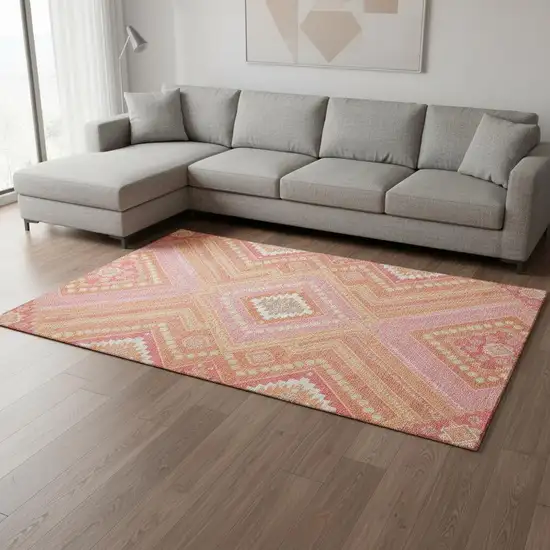 Coral Pink And Ivory Tribal Washable Area Rug With UV Protection Photo 2