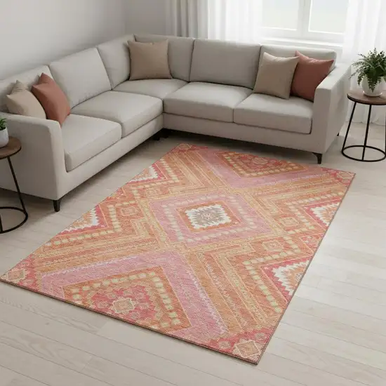 Coral Pink And Ivory Tribal Washable Area Rug With UV Protection Photo 2