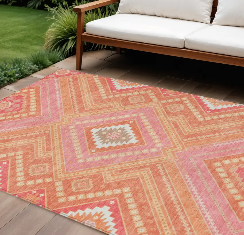 Coral Pink And Ivory Tribal Washable Indoor Outdoor Area Rug Photo 1