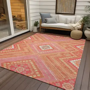 Photo of Coral Pink And Ivory Tribal Washable Indoor Outdoor Area Rug
