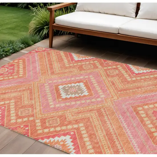Coral Pink And Ivory Tribal Washable Indoor Outdoor Area Rug Photo 1