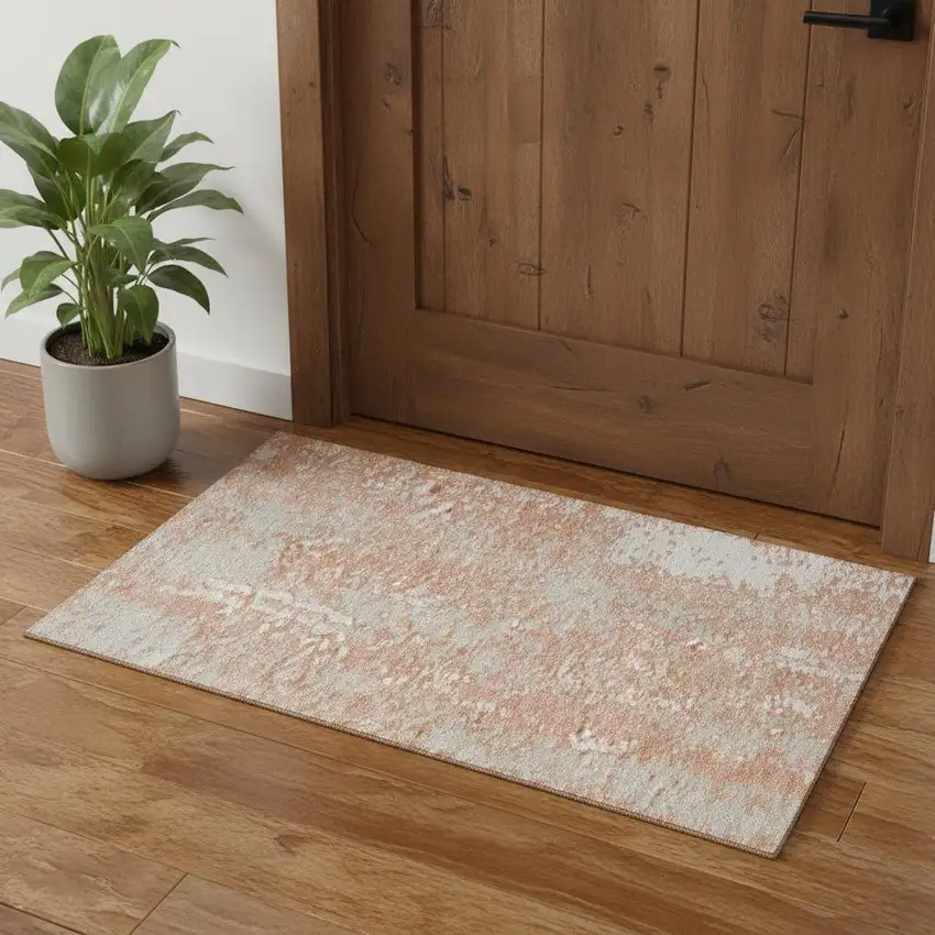 Coral Taupe And Ivory Abstract Washable Area Rug With UV Protection Photo 1