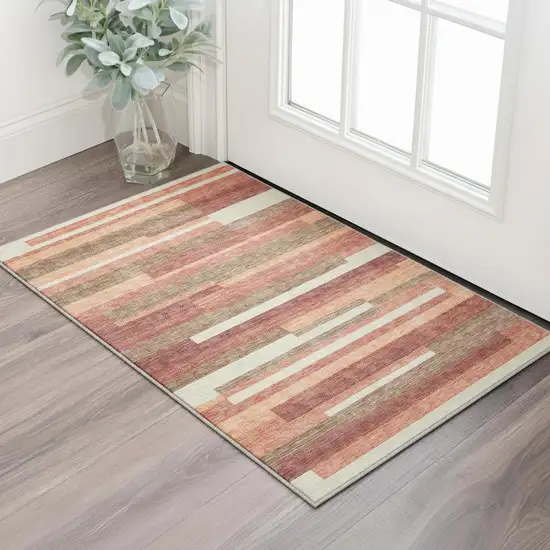 Coral Taupe And Orange Striped Washable Area Rug With UV Protection Photo 2