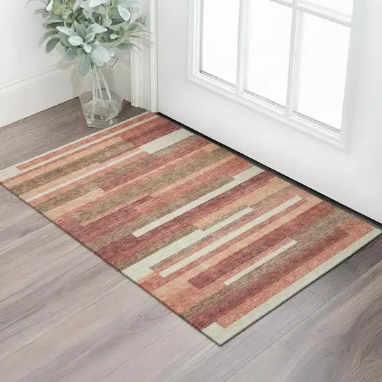Coral Taupe And Orange Striped Washable Area Rug With UV Protection Photo 1