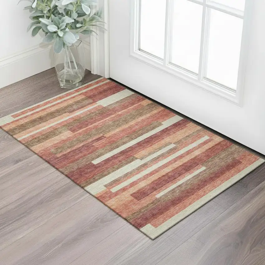 Coral Taupe And Orange Striped Washable Area Rug With UV Protection Photo 1