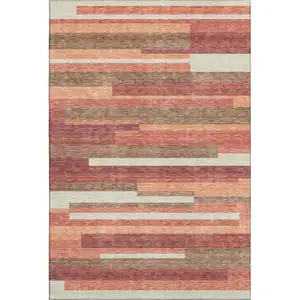 Photo of Coral Taupe And Orange Striped Washable Area Rug With UV Protection