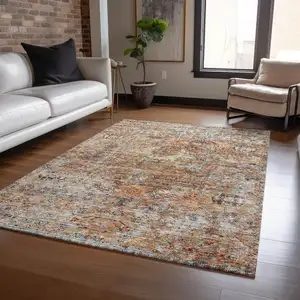 Photo of Coral Terra Cotta And Beige Floral Washable Indoor Outdoor Area Rug