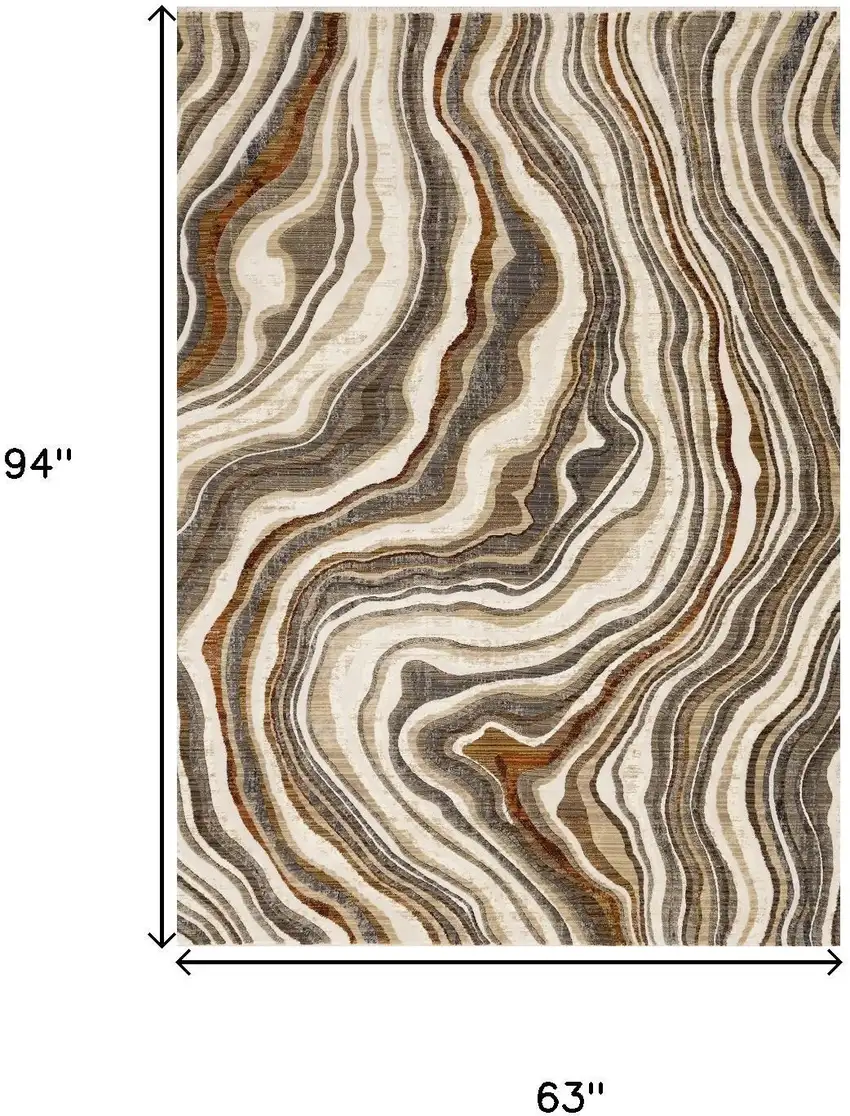 Cream And Beige Abstract Area Rug Photo 3