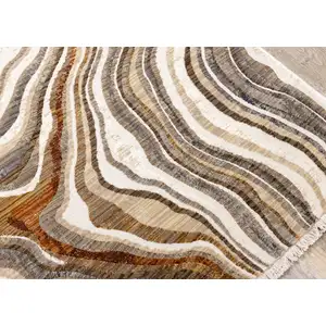 Photo of Cream And Beige Abstract Area Rug