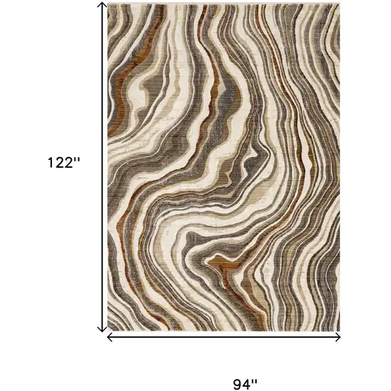 Cream And Beige Abstract Area Rug Photo 3