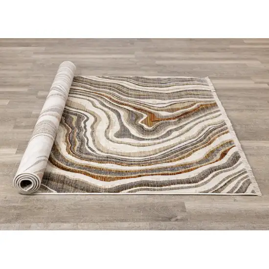 Cream And Beige Abstract Area Rug Photo 9