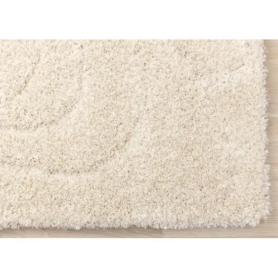 Cream And Beige Abstract Area Rug Photo 9