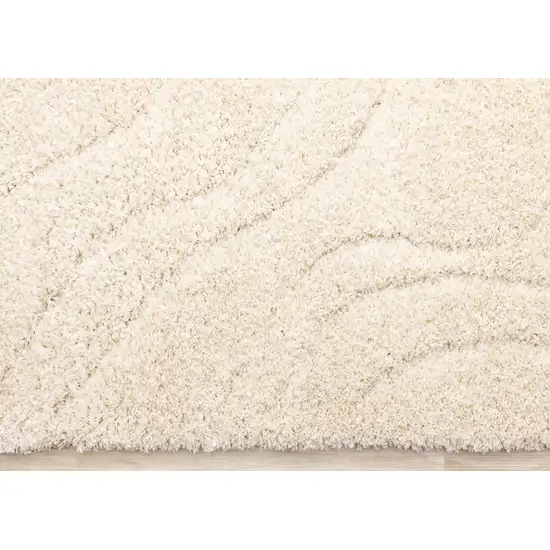 Cream And Beige Abstract Area Rug Photo 8
