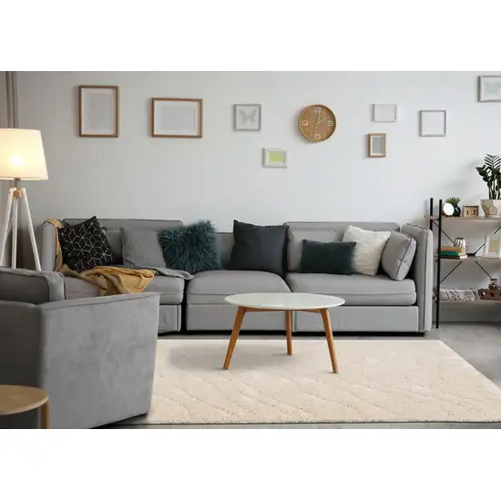 Cream And Beige Abstract Area Rug Photo 5