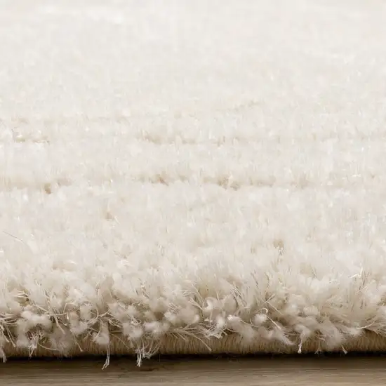 Cream And Beige Abstract Area Rug Photo 9