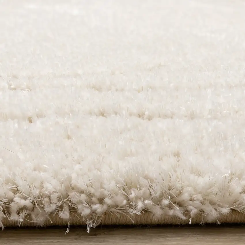 Cream And Beige Abstract Area Rug Photo 9