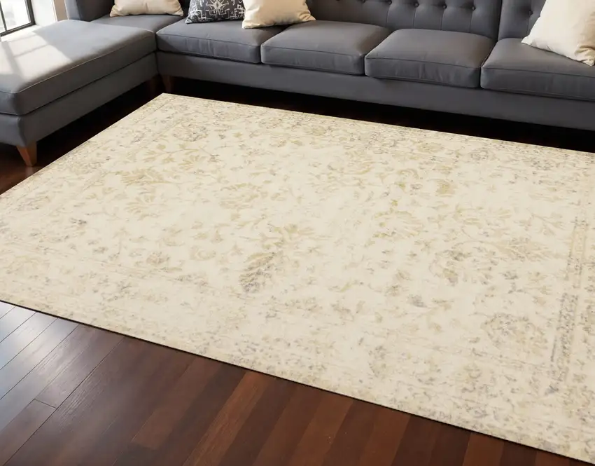 Cream And Beige Abstract Area Rug Photo 1