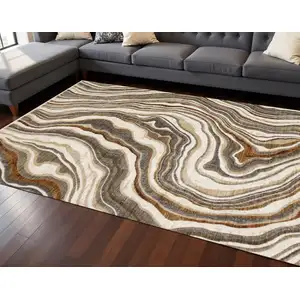 Photo of Cream And Beige Abstract Area Rug