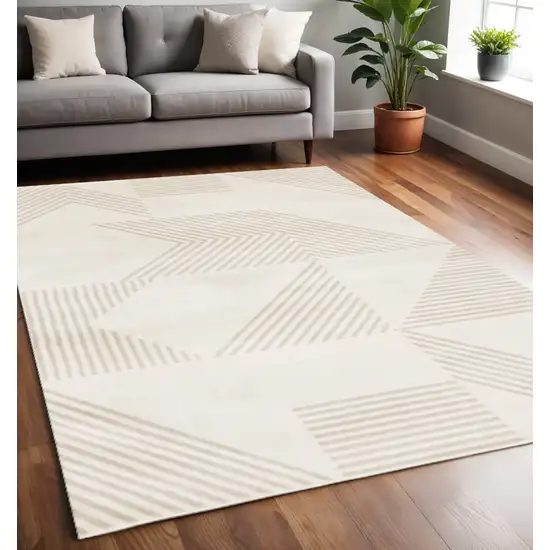Cream And Beige Geometric Area Rug Photo 1