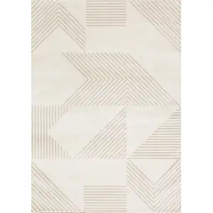 Photo of Cream And Beige Geometric Area Rug