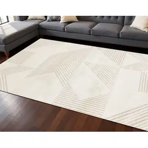 Photo of Cream And Beige Geometric Area Rug