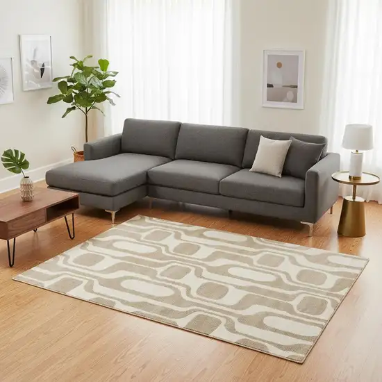 Cream And Beige Geometric Area Rug Photo 1